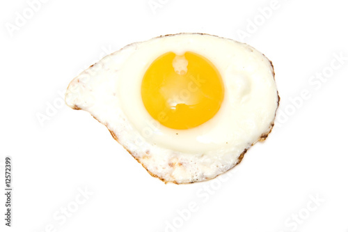 Fried egg isolated on a white studio background. photo