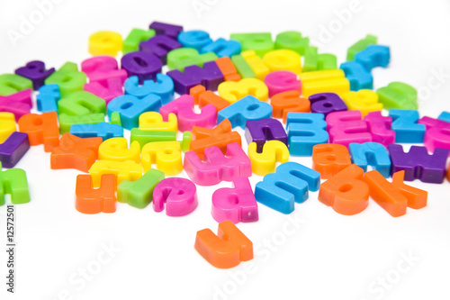 Magnetic letters isolated on a white studio background. photo