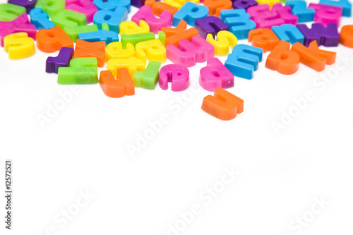 Magnetic letters isolated on a white studio background.
