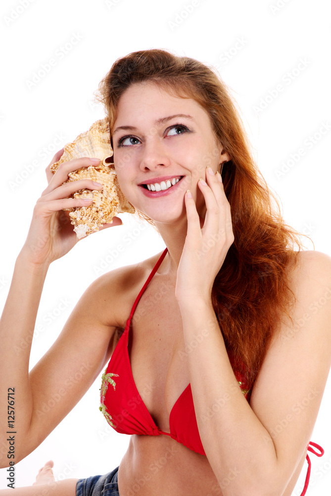 .Young beautiful girl in swimsuit on white background. .Young beautiful girl in swimsuit on white background.