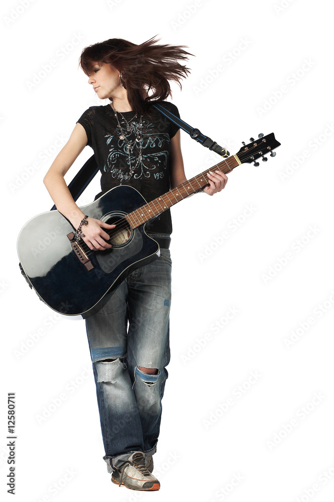 Teenager girl playing an acoustic guitar, isolated on white Teenager girl playing an acoustic guitar, isolated on white