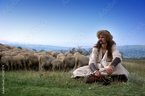 lonely shepherd with sheep