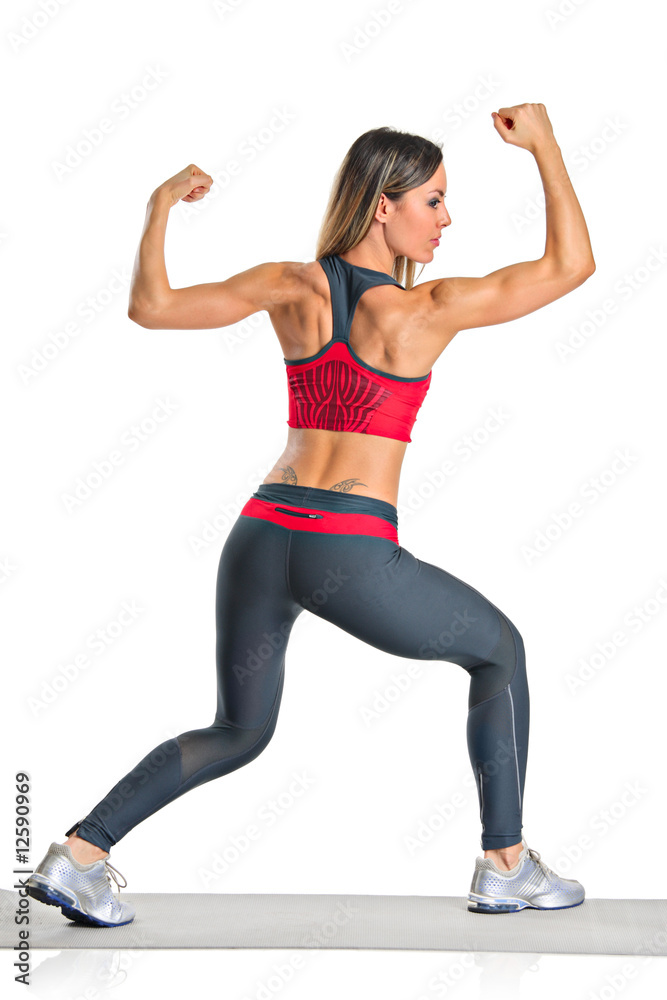 A female athlete isolated on a white background