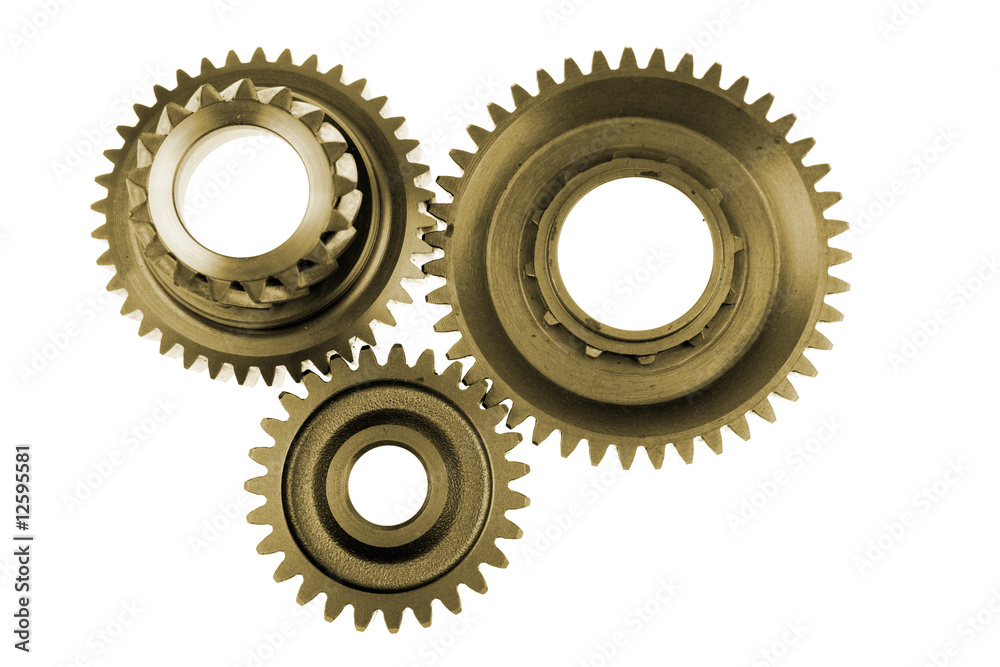 Three gears meshing together over white Three gears meshing together over white