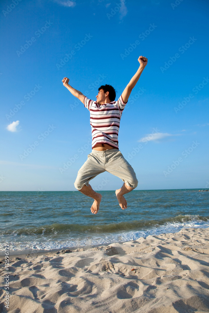 young man by the beach young man by the beach