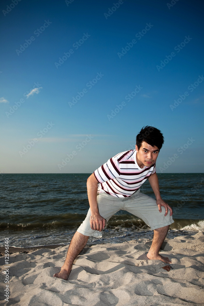 young man by the beach