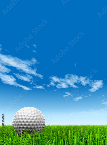 conceptual 3D golf ball on green grass over a blue sky