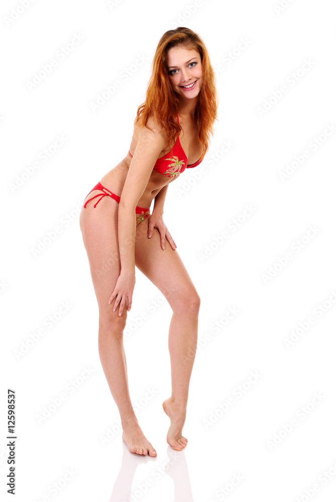Young beautiful girl in swimsuit on white background. Young beautiful girl in swimsuit on white background.
