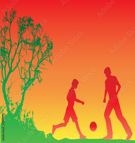 Father and son playing football
