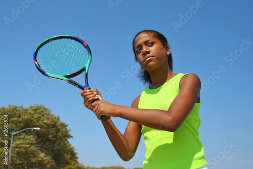 Teenage female tennis player