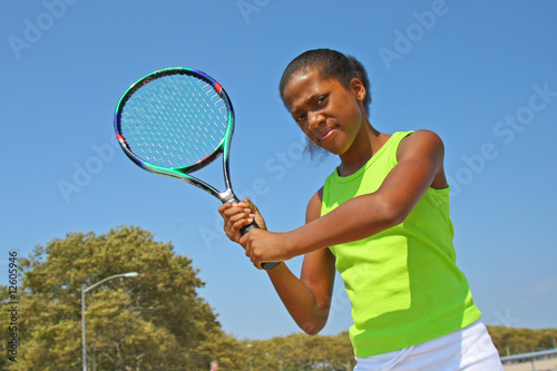 Teenage female tennis player © Julie Eydman