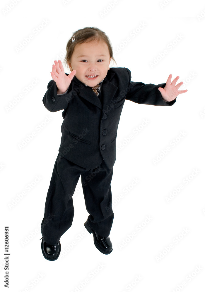 Adorable Japanese American three year old girl in business suit. Adorable Japanese American three year old girl in business suit.