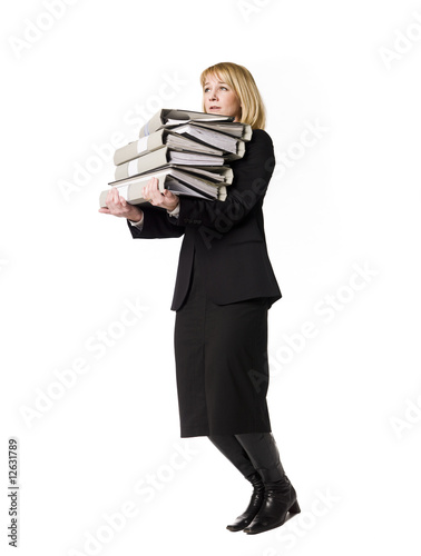 Woman carrying  folders photo