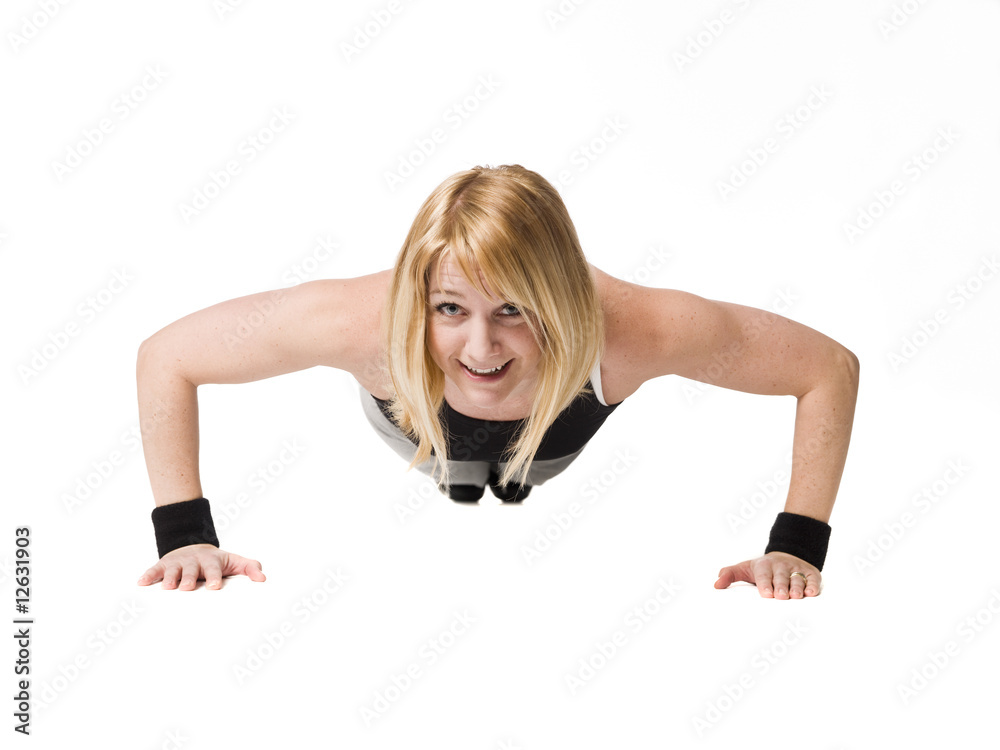 Woman doing push ups Woman doing push ups
