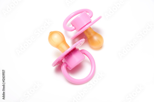 Vászonkép Babies dummy or pasifier isolated on a white studio background