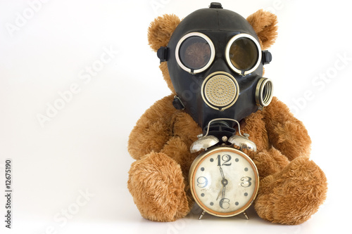 The Nursery toy, gas mask, old watch on white background.