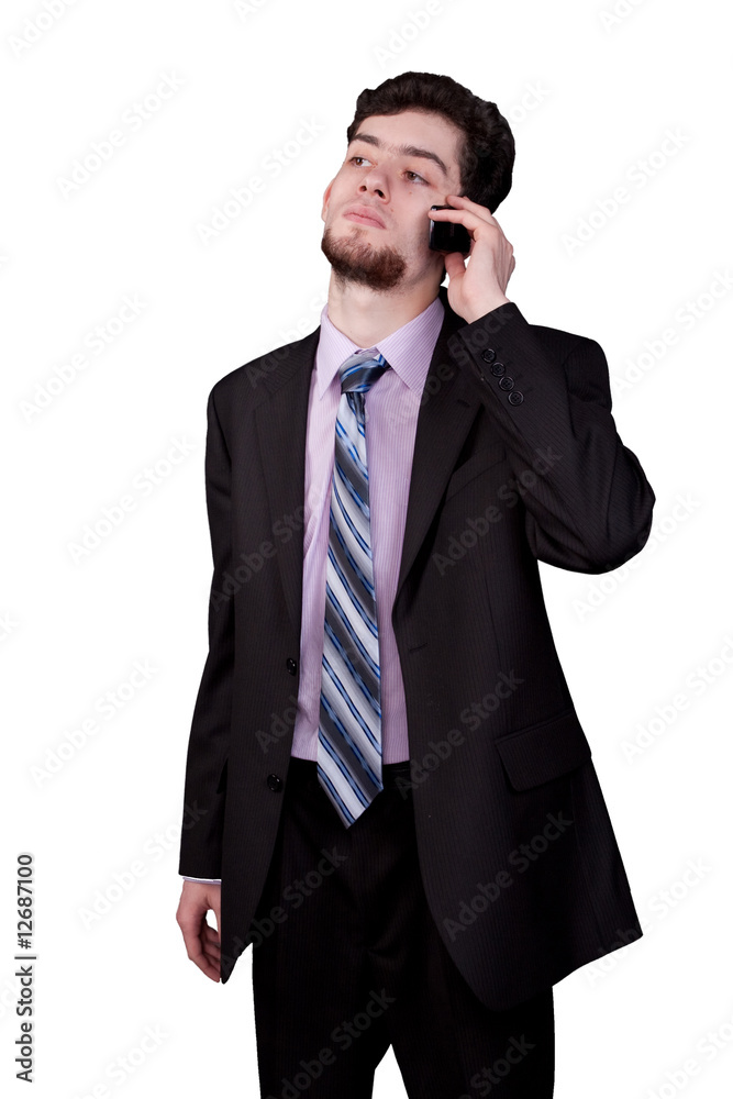 young businessman talking using mobile phone young businessman talking using mobile phone