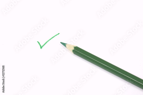 Green check mark and pencil