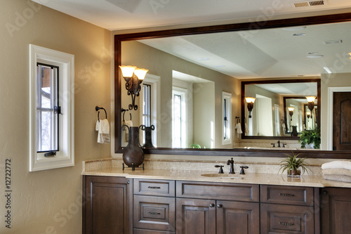 Master Bath with Large Mirror and Reflections