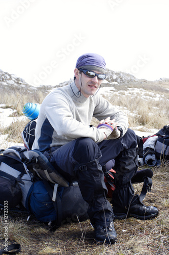 smiling hiker in glasses