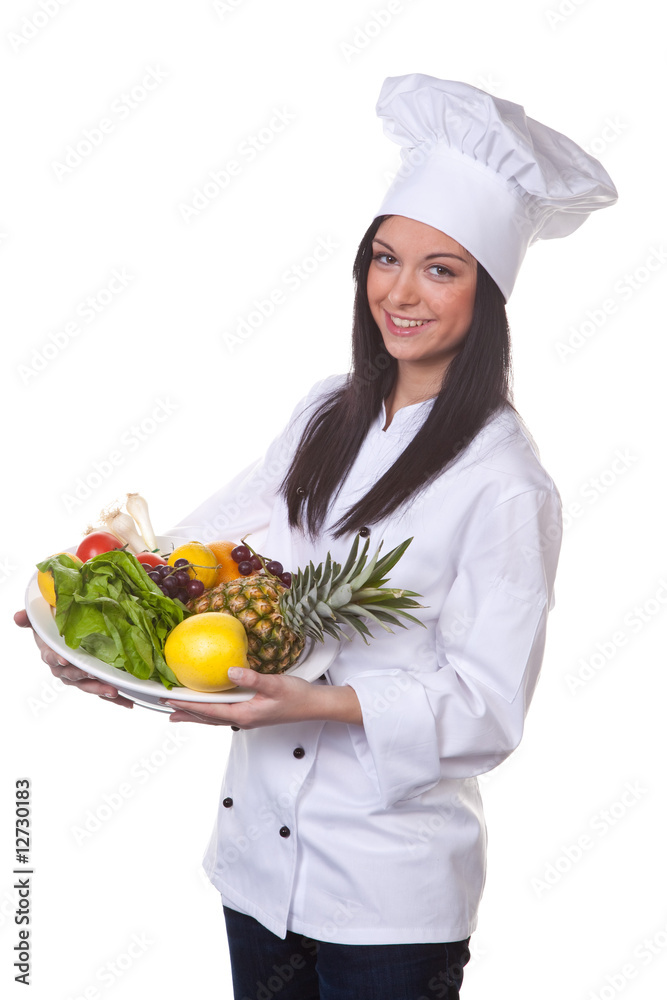 Köchin serviert ein Obst und Gemüse Schale
