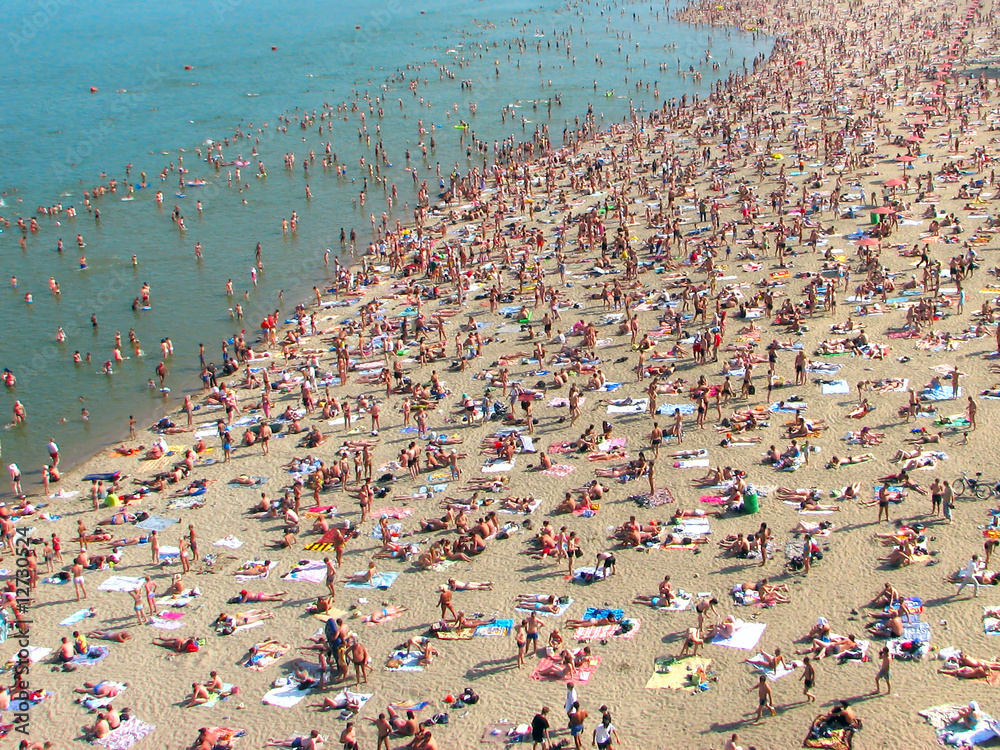 view on the beach with many peoples