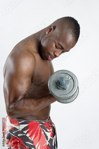 muscular man lifting weights