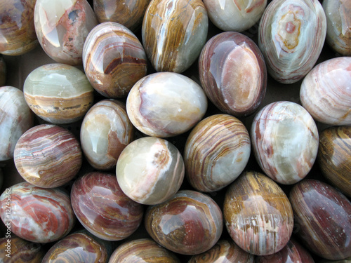 Background of onyx stone eggs of different colors