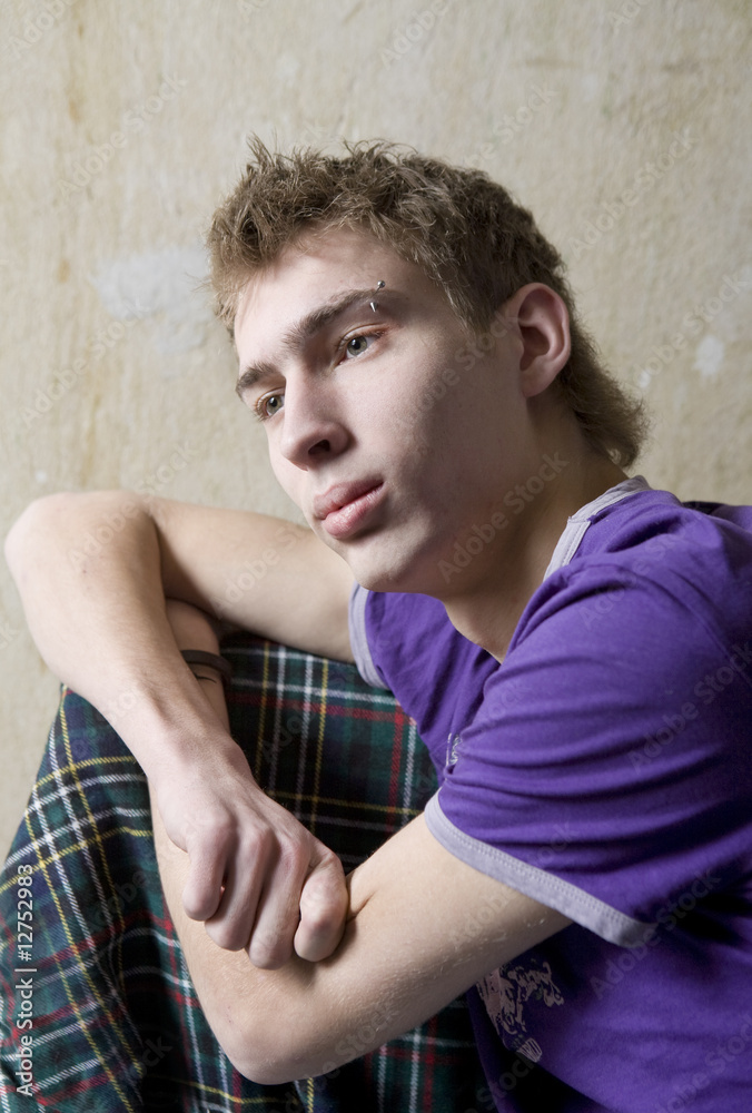 Obraz premium portrait of young blond cute sad man