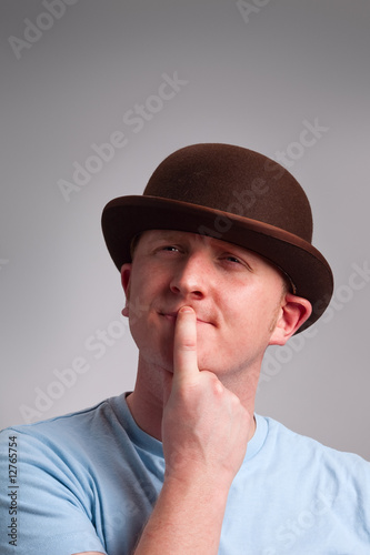 Thinking man in bowler hat