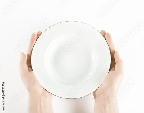empty plate in hand
