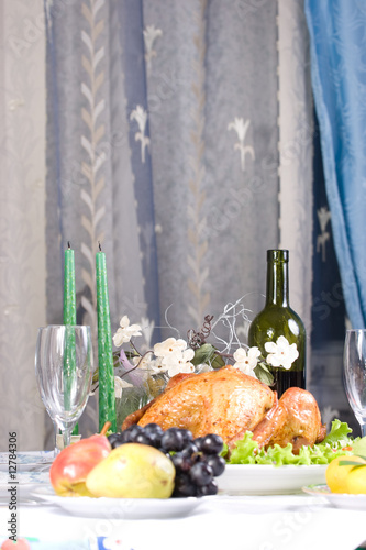 Feasting backed turkey on holiday table ready to eat