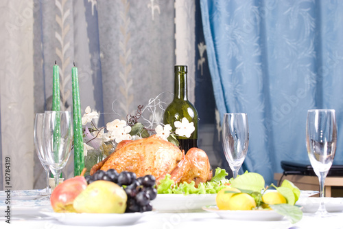 Feasting backed turkey on holiday table ready to eat