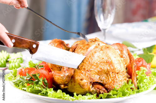 Feasting backed turkey on holiday table ready to eat