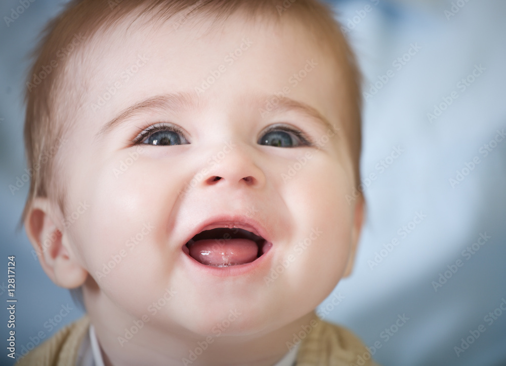 Portrait of happy blue-eyes baby