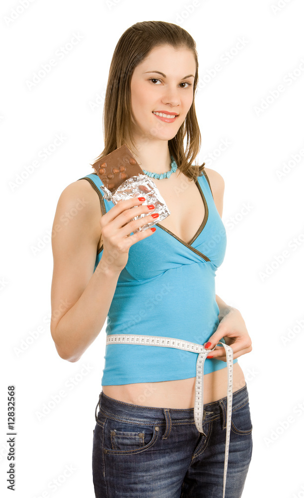 Beautiful girl with a chocolate tablet. Isolated on white
