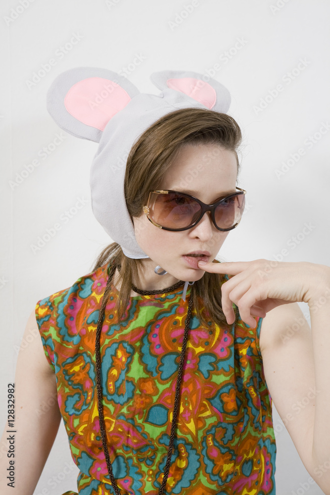 girl wearing cap with mouse ear. Glamour woman