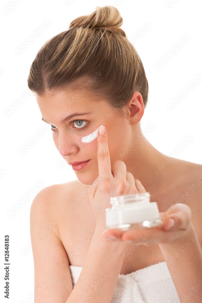 Body care series - Blond woman applying cream Body care series - Blond woman applying cream