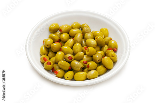 Plate with olives isolated on the white background