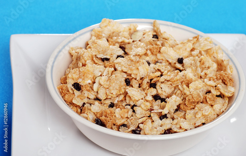 closeup bowl of cereal with dried  blueberries