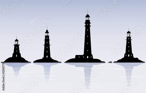 Four black lighthouses over evening sky with stars