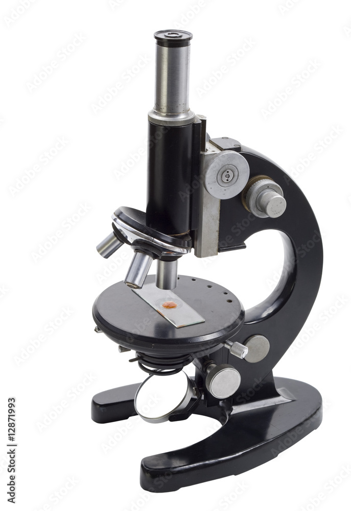 Old scientific microscope on white background Old scientific microscope on white background