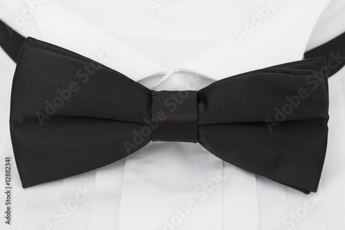 close up of a black tie and shirt collar