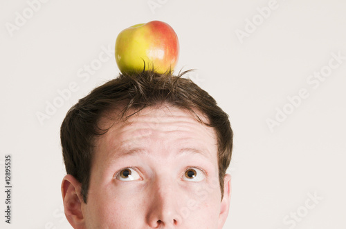look to the apple on head photo