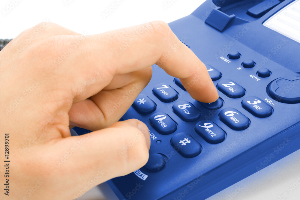 fingers dialing number on telephone fingers dialing number on telephone