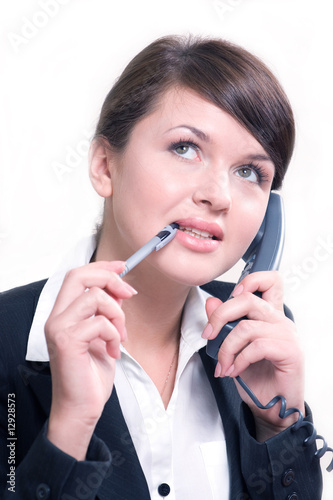 Portrait of young beautiful woman in office environment