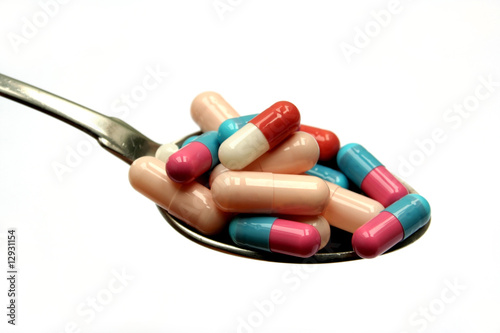 pills on spoon