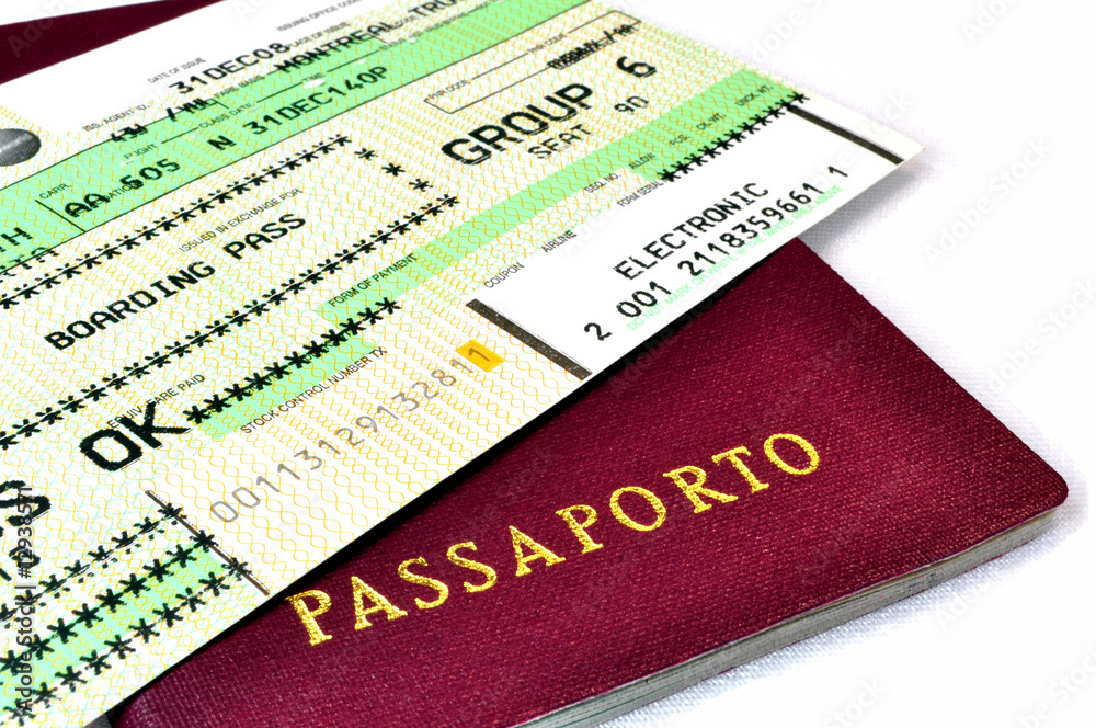 Italian passport and air travel boarding pass. Italian passport and air travel boarding pass.