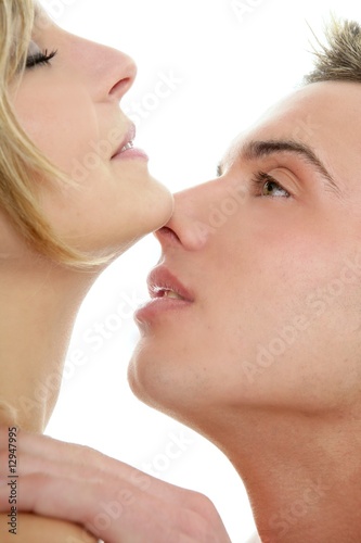 Kiss over white, young passion couple