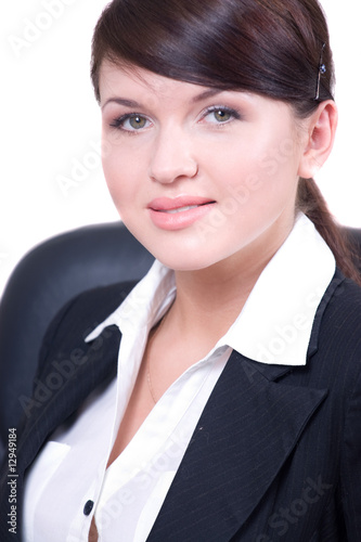 Portrait of young beautiful woman in office environment